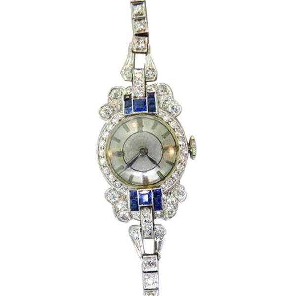 IWC International Platinum Diamond Sapphire Watch: Platinum case 18mm excl. crown x 28mm lug tip to lug tip. Diamonds and sapphires. 15 jewel movement,adjusted to 2 positions. running order. Gross weight 20.5g