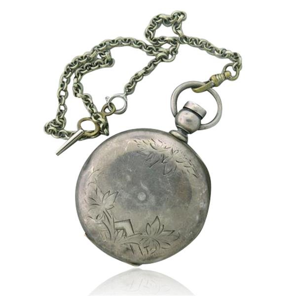 Antique Waltham Silver Pocket Watch: Silver watch case is 55mm in diameter, case thickness - 18.9mm . Porcelain dial - minor chip in the center. Movement :Bartlet,Waltham Mass,1857897. Key wind - running.