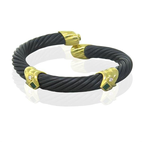 18k Gold Diamond Emerald Bracelet: Bracelet will fit up to 6" wrist . 18k gold and rubber?. Diamonds and emeralds, weight - 20..2g