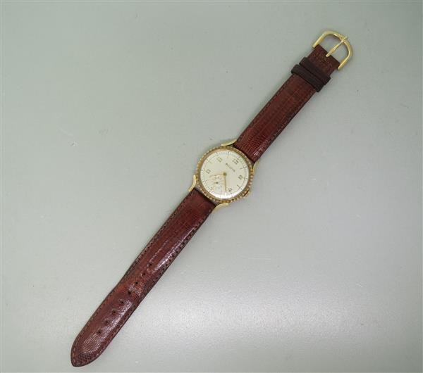Vintage Bulova Gold Filled Hobnail Bezel Manual Watch: Gold Filled 30mm case (excluding crown). Manual Wind 21 Jewels cal. 10AK. Not Running, Stops and Goes.