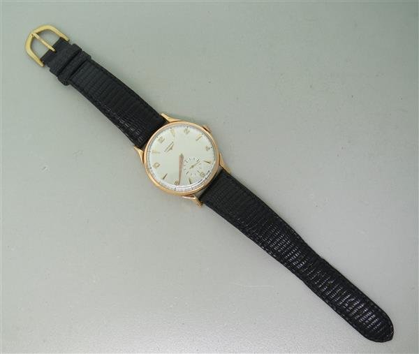 Vintage Longines 18k Gold Mens Watch: 36mm 18k Rose Cost Case. 17 Jewels Movement. Dial and movement signed. Functions: Hours, Minutes, Seconds. Crystal Has Chip. Stops and Goes.