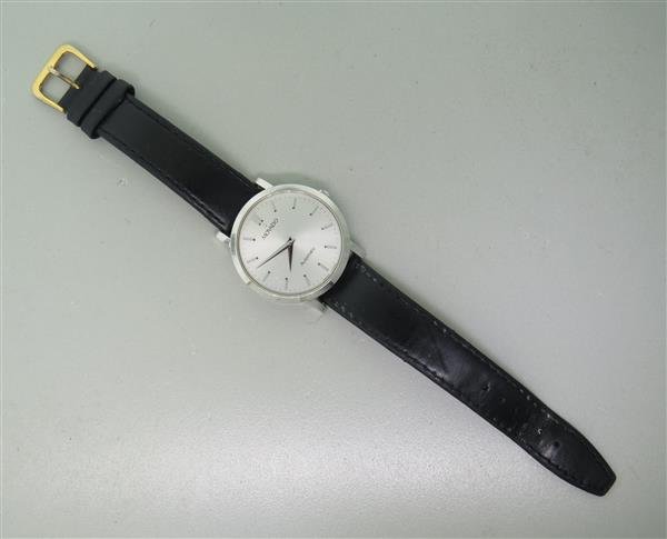 Movado Steel Skeleton Back Automatic Watch: Case - 37mm in diameter. Skeleton back. signed - Movado,water resistant,sapphire crystal,6650470,84 F4 1890. Automatic movement - running order. Silver tone dial.