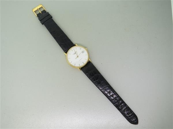 Longines 18k Gold Automatic Watch: Case - 18k gold, 32mm in diameter. Back signed - L4 714 6, 18k,750,30154238. Movement - automatic,running order. Center second hand,date at 3 o'clock.