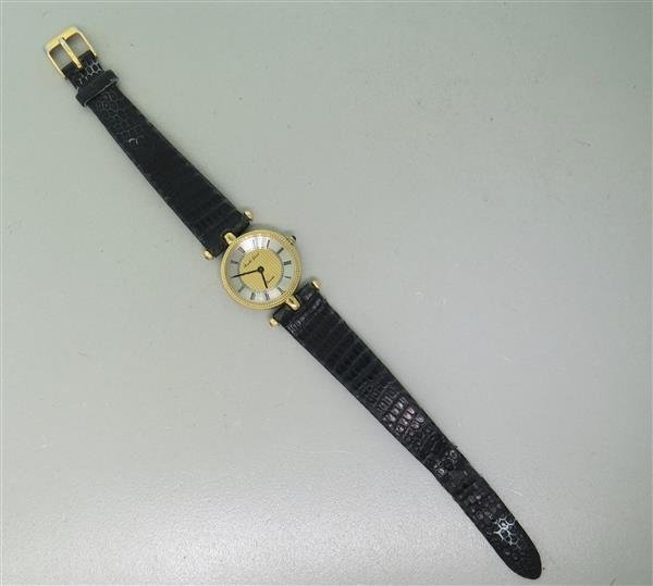 Bueche Girod 14k Gold Ladies Watch: 27mm 14k Gold Case. Sapphire Cabochon on Crown. Roman Numeral Dial. Functions: Hours, Minutes. Quartz Movement. Working Order.