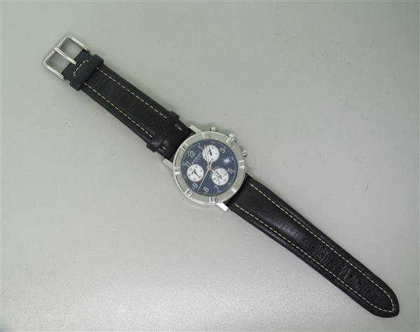 Raymond Weil W1 Stainless Steel Chronograph Mens Watch: 38mm Stainless Steel Case. Functions: Hours, Minutes, Seconds, Date, Chronograph. Quartz Movment. Running Order, Chronograph Needs Adjustment.