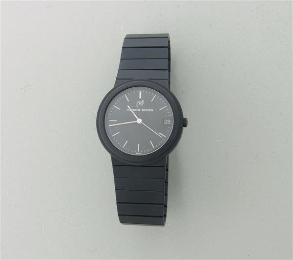 Porsche Design IWC Titanium Watch: 32mm Titanium Case. Functions: Hours, Minutes, Seconds, Date. Bracelet fits 7" Wrist. Quartz Movement. Running Order.