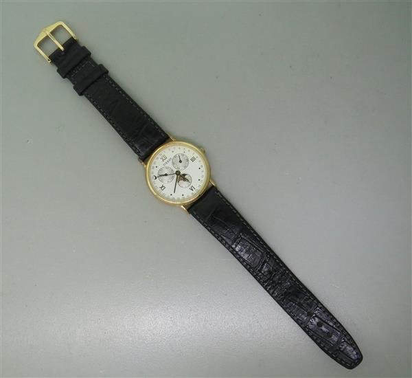 Tissot 14k Gold Steel Full Calendar Moonphase Watch: Case - 14k gold,steel back, 32mm in diameter excl. lugs and crown. Quartz movement - running order. Functions - full calendar, day,date,month,moonphase.