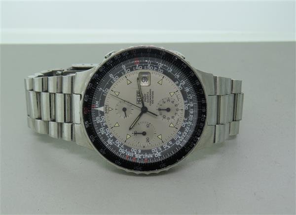 Heuer Pilot Chronograph Watch # 230006: Steel case - 43mm in diameter. ref 230 006. Quartz movement - running order. Gray dial with black bezel, 3 reg. chronograph,date at 3 o'clock,center second hand, Luminescent Hour Markers; Black Mi