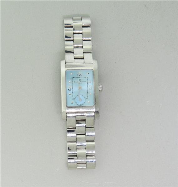 Baume & Mercier Blue Dial Ladies Watch: Steel case - 20mm x 33mm lug tip to lug tip. Quartz movement - not running. Blue dial ,small second hand at 6 o'clock. Original band and buckle