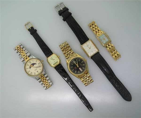 Lot of Five Citizen Watches: Lot Consists Of Three Mens Watches and Two Ladies Watches. Quartz Movments. One Mens Watch Has Cracked Crystal. One Mens Watch Has Skewed Dial. Not Running.