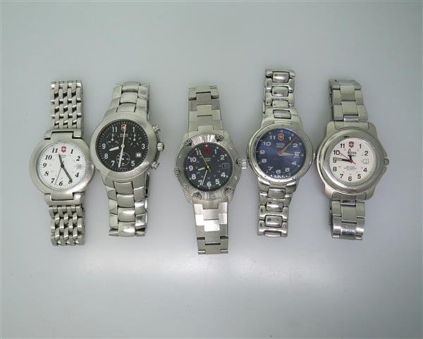 Swiss Army Stainless Steel Watch Lot of 5: Lot of 5 Swiss Army watches Functions - chronograph,date at 3 o'clock,rotating bezel. Quartz movements - not running. Some crystals are scratched.