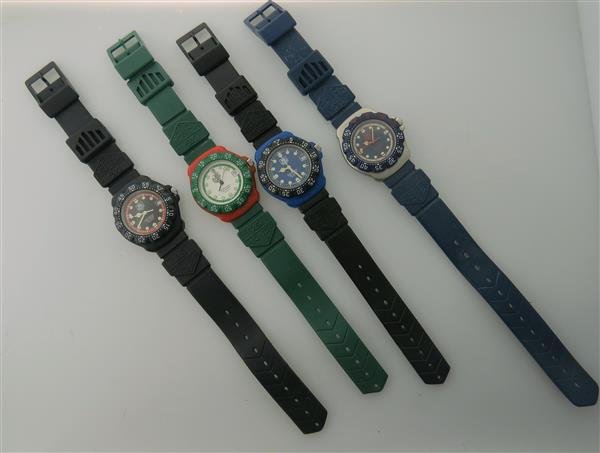 Tag Heuer Formula 1 Watch Lot of 4: Lot of 4 Tag Heuer watches . All quartz - not running. Cases 35mm in diameter. Rotating bezels with indicators,luminous hands/markers,date at 3 o'clock. All original bands. Some scratches on cryst
