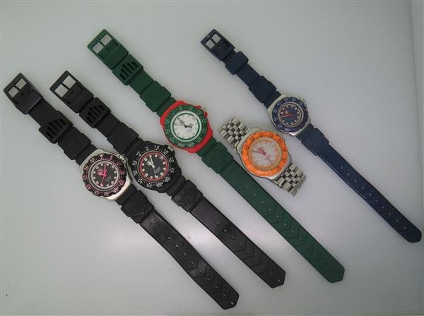 Tag Heuer Formula 1 Watch Lot of 5: Lot of 5 Tag Heuer Watches. Cases 35mm,29mm in diameter. Luminous hands/makers,date at 3 o'clock, original rubber/steel bands. Quartz - not running. minor scratches on one crystal