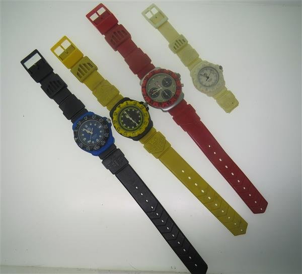 Tag Heuer Watch Lot of 4: Lot of 4 Tag Heuer watches, cases 29mm ,35mm and 37mm in diameter. Luminous hands/markers, date at 3 o'clock, 1 watch 3 reg. chronograph. Quartz - none running. Some scratches on crystals, one ban