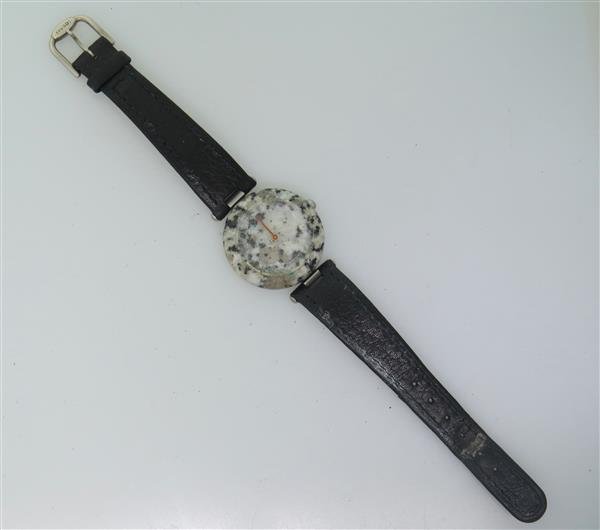 Tissot Rockwatch Quartz Watch: Case - 30mm in diameter. Quartz movement - not running. Original buckle.