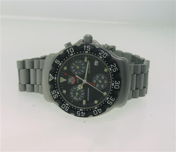 Tag Heuer Chronograph Steel Watch 571513T: Case - 37mm in diameter. Quartz movement - running order. Rotating bezel with indicators, original dial, 3 reg. chronograph,small second hand at 6 o'clock, date at 4 o'clock, luminous markers