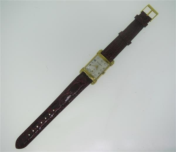 Vintage Bulova 10k Gold Filled Diamond Watch: 10k gold filled case - 20mm excl crown x 27mm excl lugs. Manual wind - running order. Original dial with dilmond and arabic markers, small second hand at 6 o'clock.,acrylic crystal.