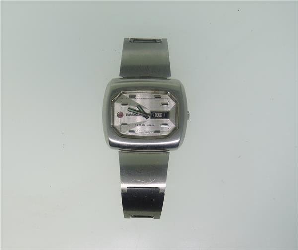 1970s Rado NCC 303 Stainless Steel Automatic Watch: Steel case - 41mm excl crown x 35mm. Automatic movement - running order. Fancy original dial, day date at 3 o'clock,center second hand. Original band and buckle.
