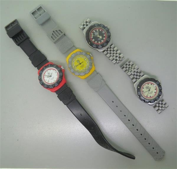 Tag Heuer Professional Watch Lot of 4: Lot of 4 Tag Heuer watches. Cases are 35mm in diameter. Functions - rotating bezels,luminous dial/hands/markers,date at 3 o'clock. One band is damaged. none are running