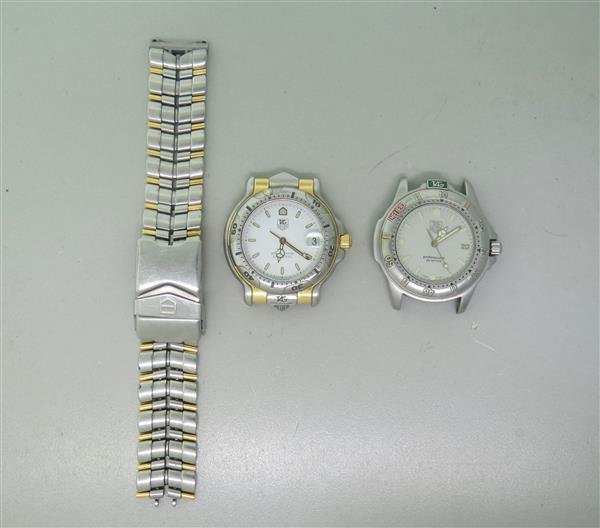 Tag Heuer Professional Watch Lot of 2: Lot of 2 Tag Heuer watches - cases are 37mm in diameter. Quartz - not running. Functions - date at 3 o'clock,luminous markers/hands,rotating bezel. One band is missing,one detached.