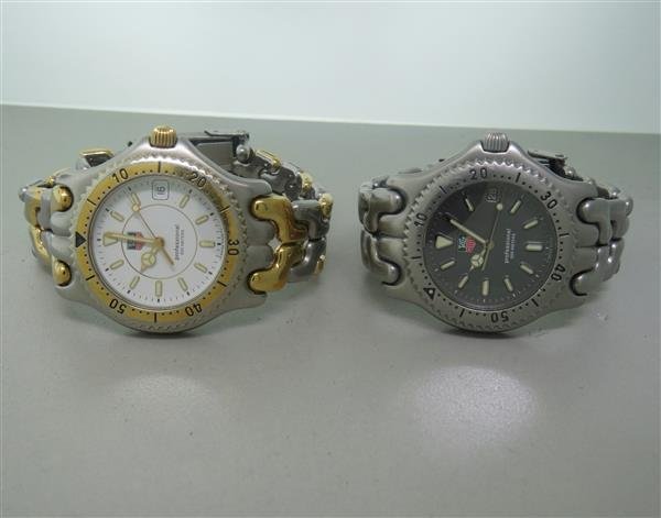 Tag Heuer Link Professional Watch lot of 2: Lot of 2 Tag Heuer watches - cases 37mm in diameter. Quartz - not running. White and metallic grey dial with luminous markers/hands,date at 3 o'clock,rotating bezel. Original bands and buckles.