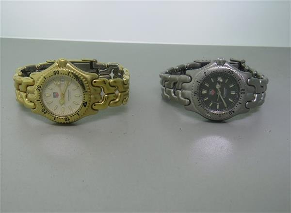 Tag Heuer Link Professional Ladies Watch Lot of 2: Lot of 2 Tag Heuer watches - cases 28mm in diameter. Quartz - not running. Dials with luminous markers/hands,date at 3 o'clcok,rotating bezels, original band buckle.