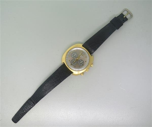 1970s Movado 18k Gold Datron HS360 Chronograph Watch: Heavy Large 18k gold case - 40mm excl crown x 40mm lug tip to lug tip. Automatic movement - running order,one pusher does not work. Original two tone dial with 3 reg chronograph,small second hand,gold