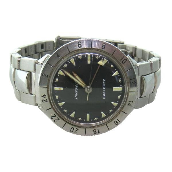 Bulova Accutron Astronaut Electric Watch: Stainless steel case - 37mm in diameter. Not running. Black dial with luminous markers and hands,center second hand. Case is marked K04539, M6