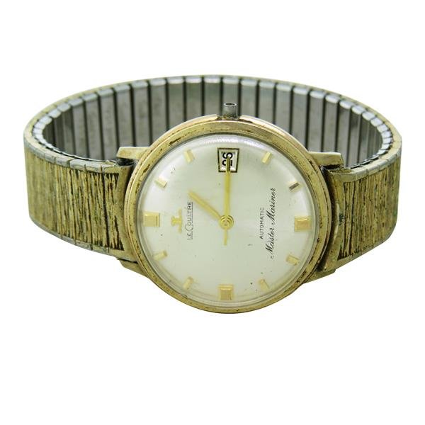 LeCoultre Master Mariner GF Watch: Gold filled case - 33mm in diameter. Not running,missing crown. Scratches on crystal. Gold stick markers,date at 3 o'clock.
