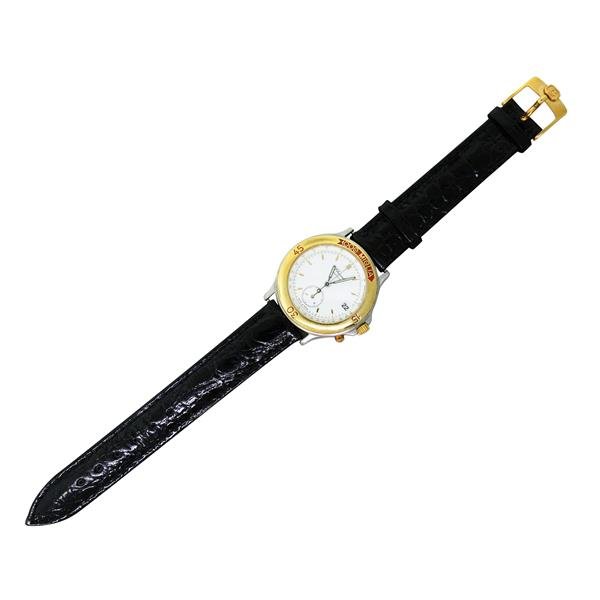 Chopard Steel and Gold Two Tone Watch: Case - 33mm in diameter. Quartz - running. Gold bezel, white dial with gold stick markers,date at 3 o'clock.Original band.