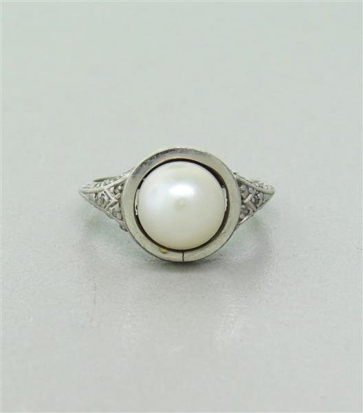 Antique 18K Gold Pearl Diamond Ring: Pearl - 8.4mm in diameter, Ring size 6. Tested 18K, Weight - 4.8gColor stones have not been tested for color and clarity enhancement,unless stated otherwise. Watches are guaranteed to be in running or