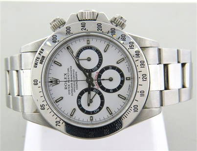 Rolex Daytona Chronograph Mens Watch ref. 16520: Rolex Daytona Stainless Steel Chronograph Mens Watch, ref. 16520, serial T131***, year 1996. Case size 40mm. Functions: Hours, Minutes, Seconds, Chronograph. The watch comfortably fits up to a 7"