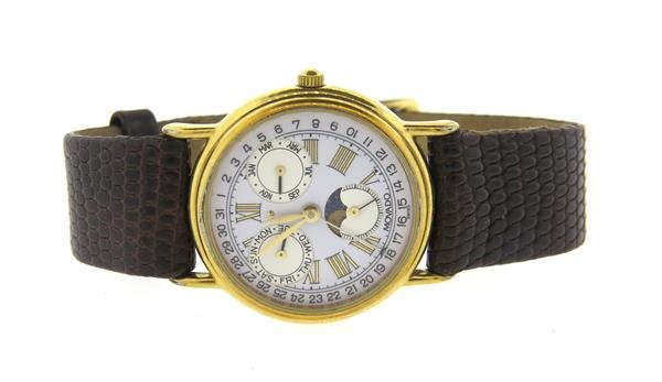 Movado Triple Date Moonphase Watch: Gold tone case - 27mm in diameter. Quartz movement - running order. Triple date and moonphase, water resistant case.Watches are guaranteed to be in running order, if described as such, at the time of