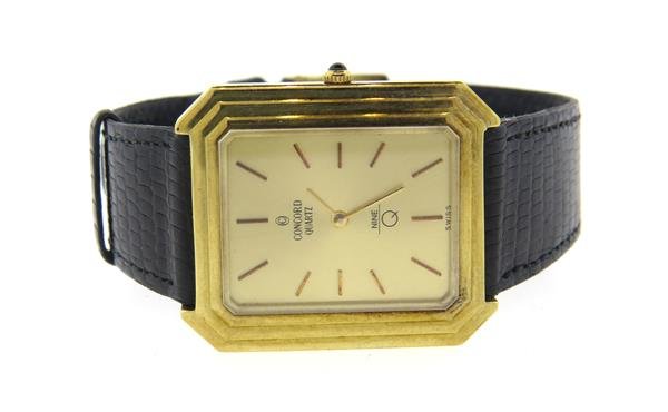 14k Gold Concord Leather Band Watch: 14k gold case - 27mm excl crown x 31mm lug tip to lug tip. Sapphire crown, gold dial with gold stick markers. Quartz - running order. Concord band and gold tone buckle.Watches are guaranteed to be in 