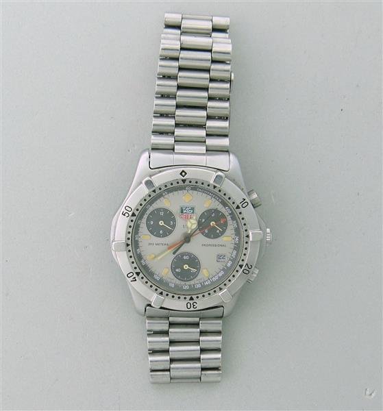 Tag Heuer Professional Chronograph Watch 560.206: Case - 36mm in diameter. Quartz movement - running order. Rotating bezel, gray dial with three reg. chronograph, date at 4 o'clock. Part of buckle is missing.Watches are guaranteed to be in runnin