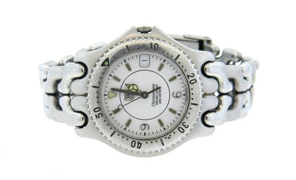 Tag Heuer Chronometer Watch WG5113 P0: Case - 36mm in diameter. Rotating bezel, white dial, center second hand,date at 3 o'clock. Quartz movement - not running