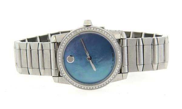 Movado Vizio Mother of Pearl Diamond Watch: Case - 26mm in diameter, diamond bezel, mother of pearl dial with 1 marker. Quartz - running order.