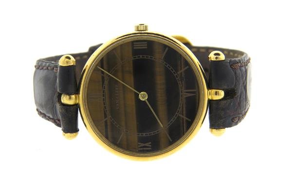 Van Cleef & Arpels VCA 18k Gold Tiger's Eye: 18k gold case - 26mm in diameter, tiger's eye dial with roman numerals. Manual wind - running orderWatches are guaranteed to be in running order, if described as such, at the time of listing only.