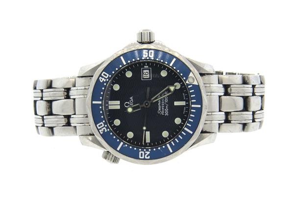 Omega Seamaster Professional Watch: Case - 36mm in diameter. Blue dial with luminous markers and hands, date at 3 o'clock, water resistant case. Original buckle. Quartz - running Watches are guaranteed to be in running order, if des