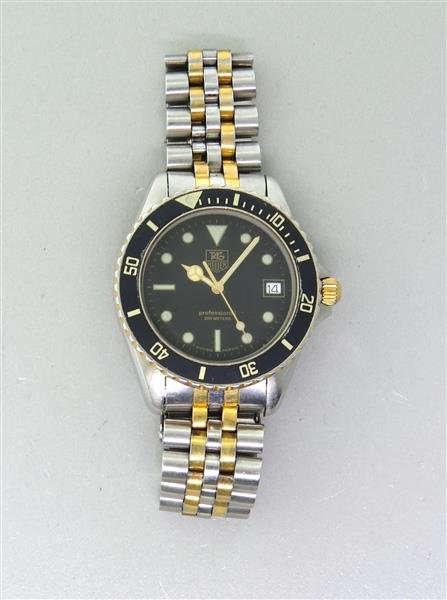 Tag Heuer Professional Watch 980.020B: Case 36mm in diameter. Rotating bezel, black dial with luminous hands and markers, date at 3 o'clock. Quartz movement - running orderWatches are guaranteed to be in running order, if described as 