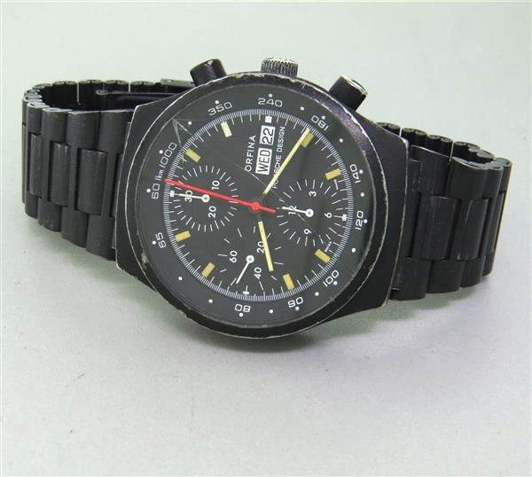 Porsche Design Orfina Day Date Chronograph Watch 7750: Case - 40mm in diameter. Black case and dial, with 3 reg. chronograph, day & date at 3 o'clock. Automatic movement - running order. Crystal needs to be replacedWatches are guaranteed to be in 
