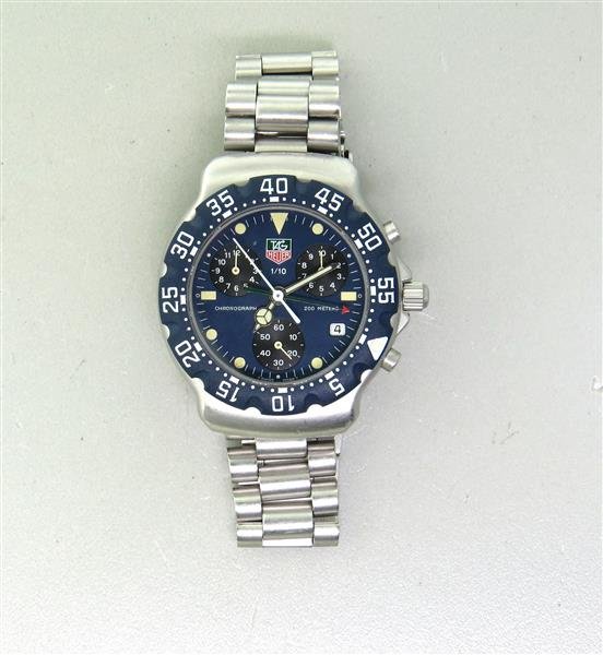 Tag Heuer 200m Chronograph Watch 570 513: Case - 37mm in diameter. Blue rotating bezel, blue dial with 3 reg. chronograph, date at 4 o'clock, luminous markers and hands. Quartz - running order.Watches are guaranteed to be in running order