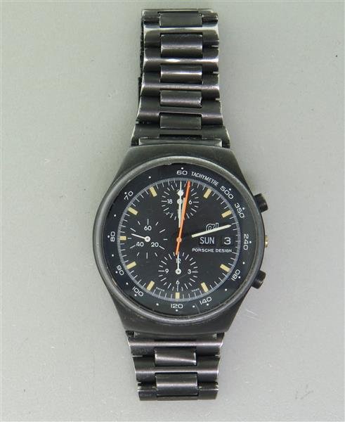 Porsche Design Day Date Chronograph Watch 7176S: Case - 40mm in diameter. Black dial with 3 reg. chronograph, day and date at 3 o'clock, missing crown. Automatic movement - running order. Watches are guaranteed to be in running order, if describ