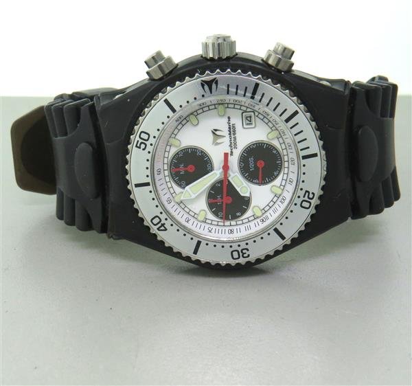 TechnoMarine Chronograph Rubber Band Watch: Case - 41mm in diameter. White dial with 3 reg. chronograph, luminous markers and hands,date at 4 o'clock. Quart - running order. Original rubber band and buckle,Watches are guaranteed to be in ru