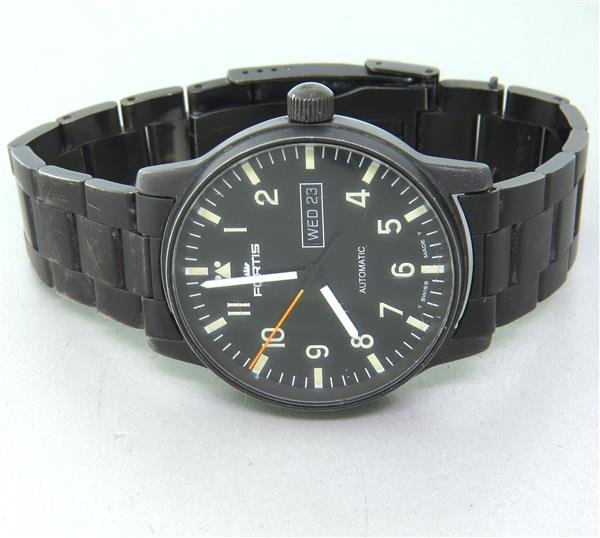 Fortis Day Date Automatic Watch: Case - 40mm in diameter. Black dial with day date at 3 o'clock, center second hand. Automatic movement - stops and goes.Watches are guaranteed to be in running order, if described as such, at the 