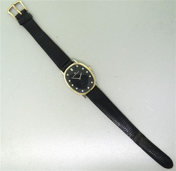Vintage Universal Geneve 14k Gold Diamond Watch: 14k gold case - 26mm excl crown x 32mm excl. lugs. Black dial with diamond markers, Triple signed, original crown. 17 jewels manual wind movement - running order.Watches are guaranteed to be in runnin