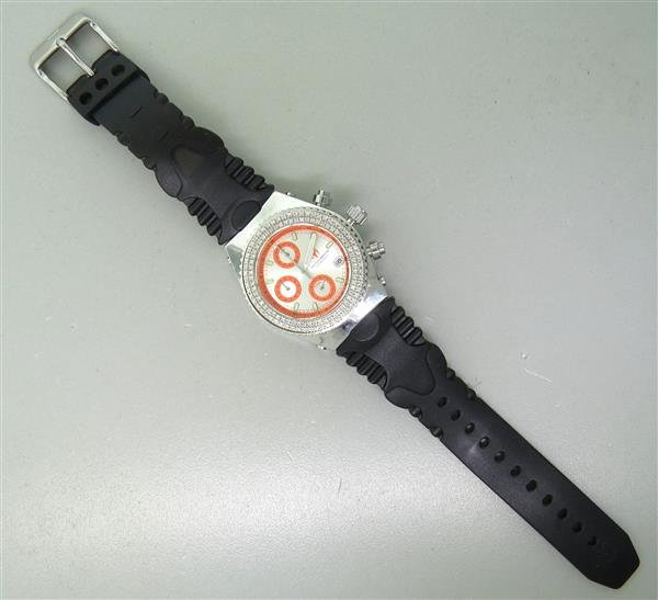 Techno Marine Diamond Chronograph Watch: Case - 36mm in diameter. Orange/silver tone dial with 3 reg. chronograph, diamond bezel,date at 4 o'clock. Quartz movement - running order. Original rubber band and buckle.Watches are guaranteed t
