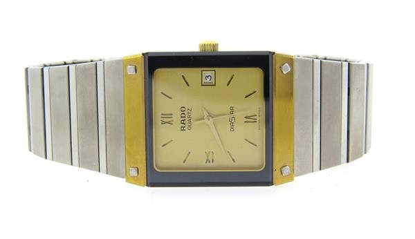 Rado DiaStar Two Tone Watch: Case - 22mm excl crown x 27mm. Quartz movement - running order. Original like new band, with protective plastic cover. Watches are guaranteed to be in running order, if described as such, at the time