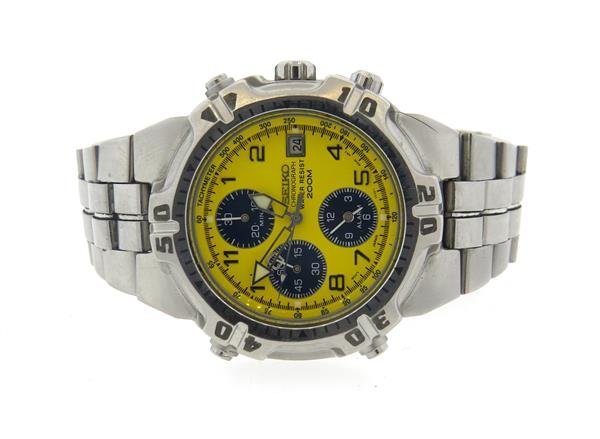Seiko 200M Chronograph Watch: Case - 40mm excl crown x 45mm lug tip to lug tip.,case is 13mm thick. Yellow dial with date at 3 o'clock, 3 reg. chronograph. 9 o'clock marker is not in place but not missing from the dial.Qua