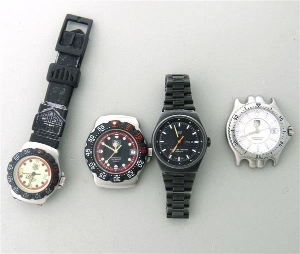 Tag Heuer Porsche Design Watch Lot of 4: Lot of 3 Tag Heuer watches (ref. WA1214, S99013M, 371.508) and 1 Porsche Design day date watch. Functions - luminous hands and markers, day date at 3 o'clock. Quartz movements - none running.Watch